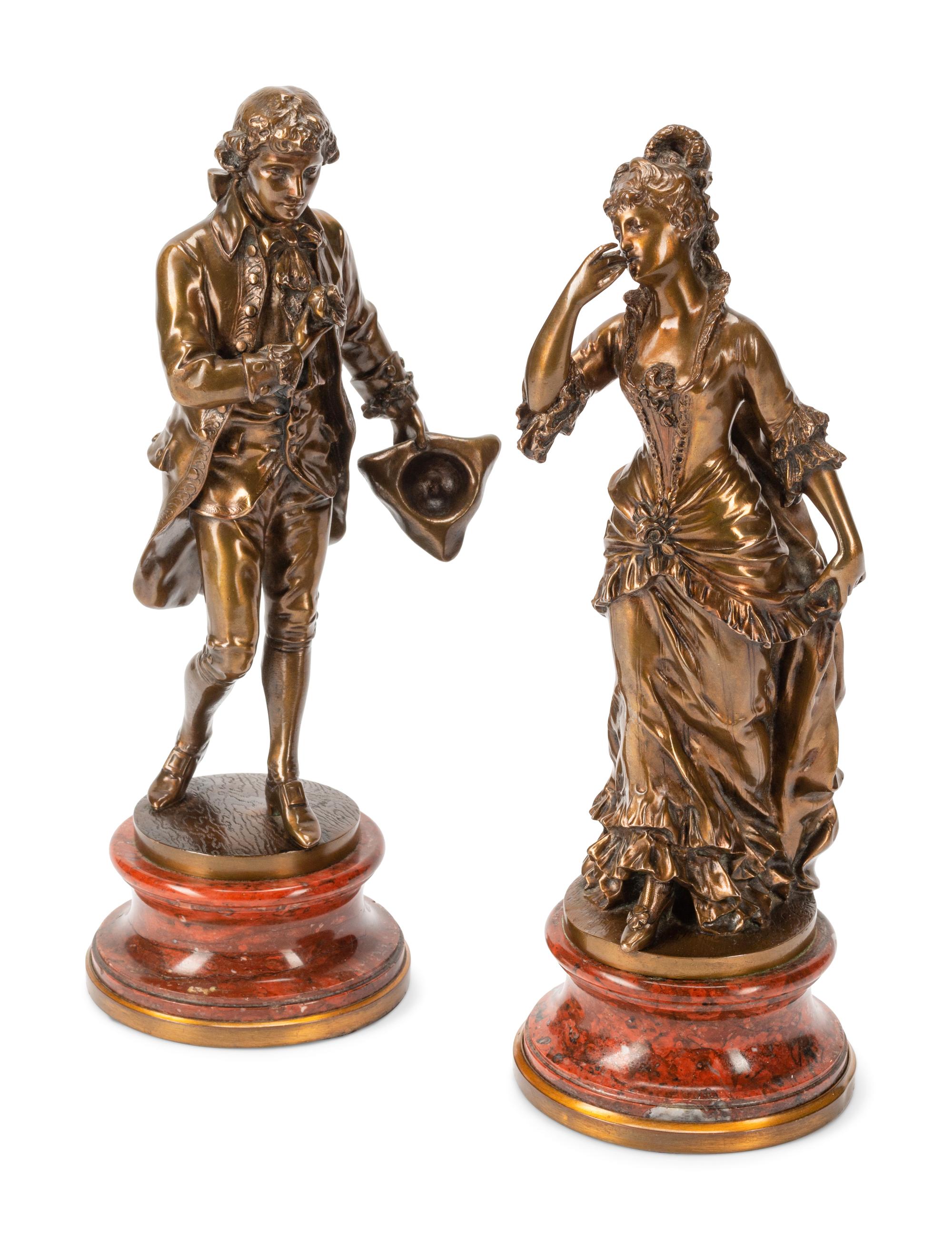 A Pair of French Gilt Bronze Figures on Rouge Marble Bases