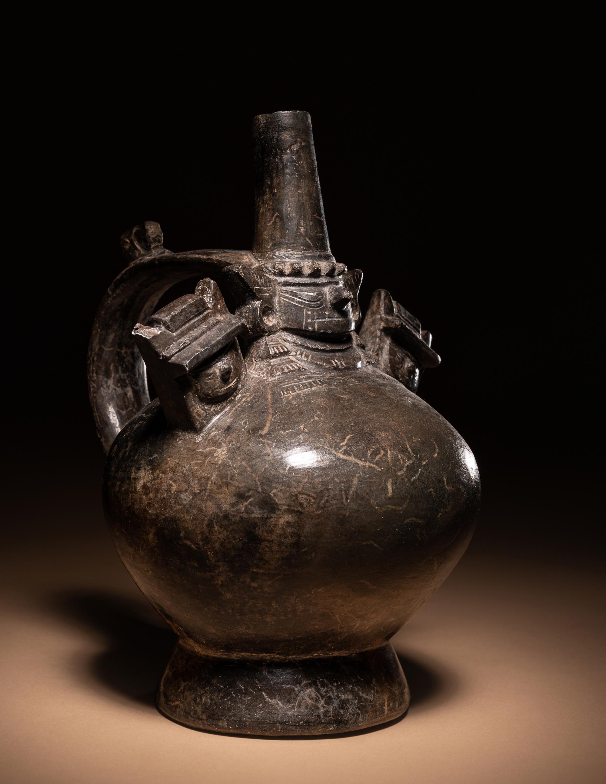 A Sican Blackware Stirrup Vessel