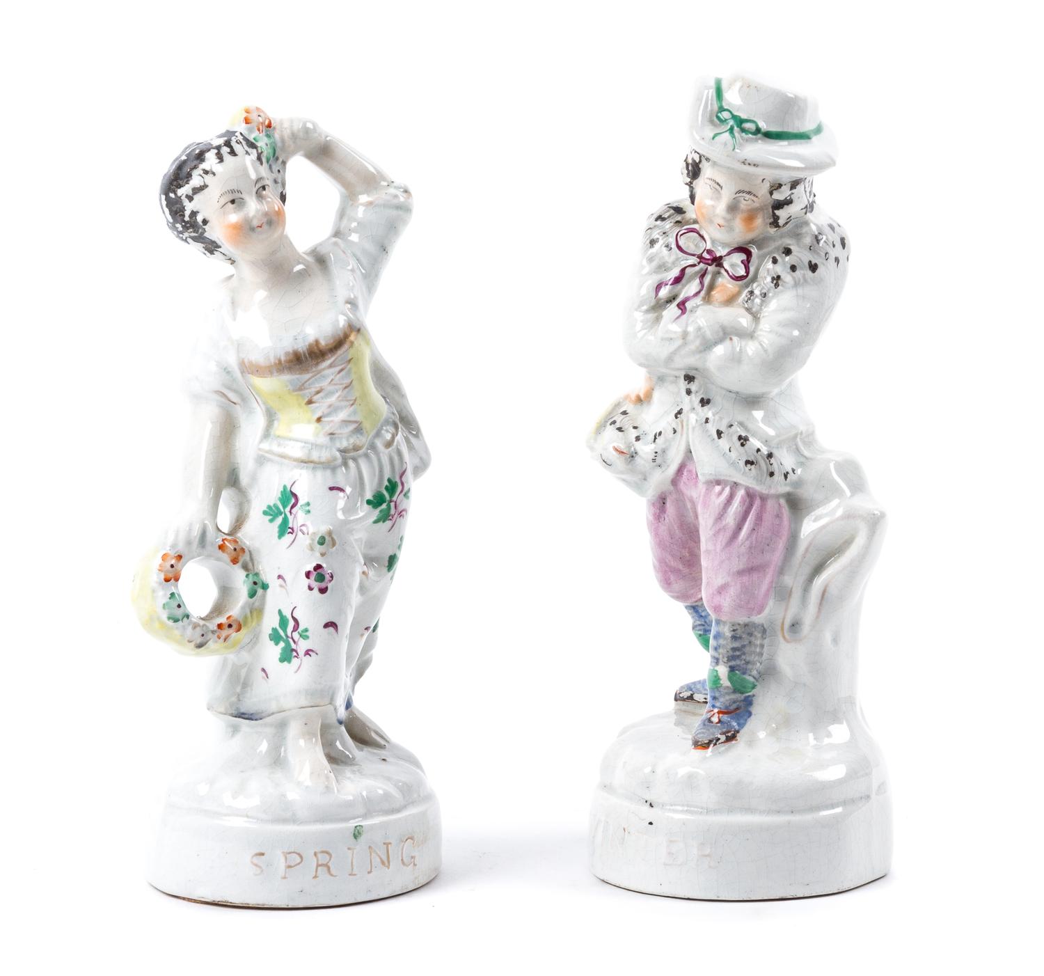 A Pair of Staffordshire Figures Height 8 3/4 inches.