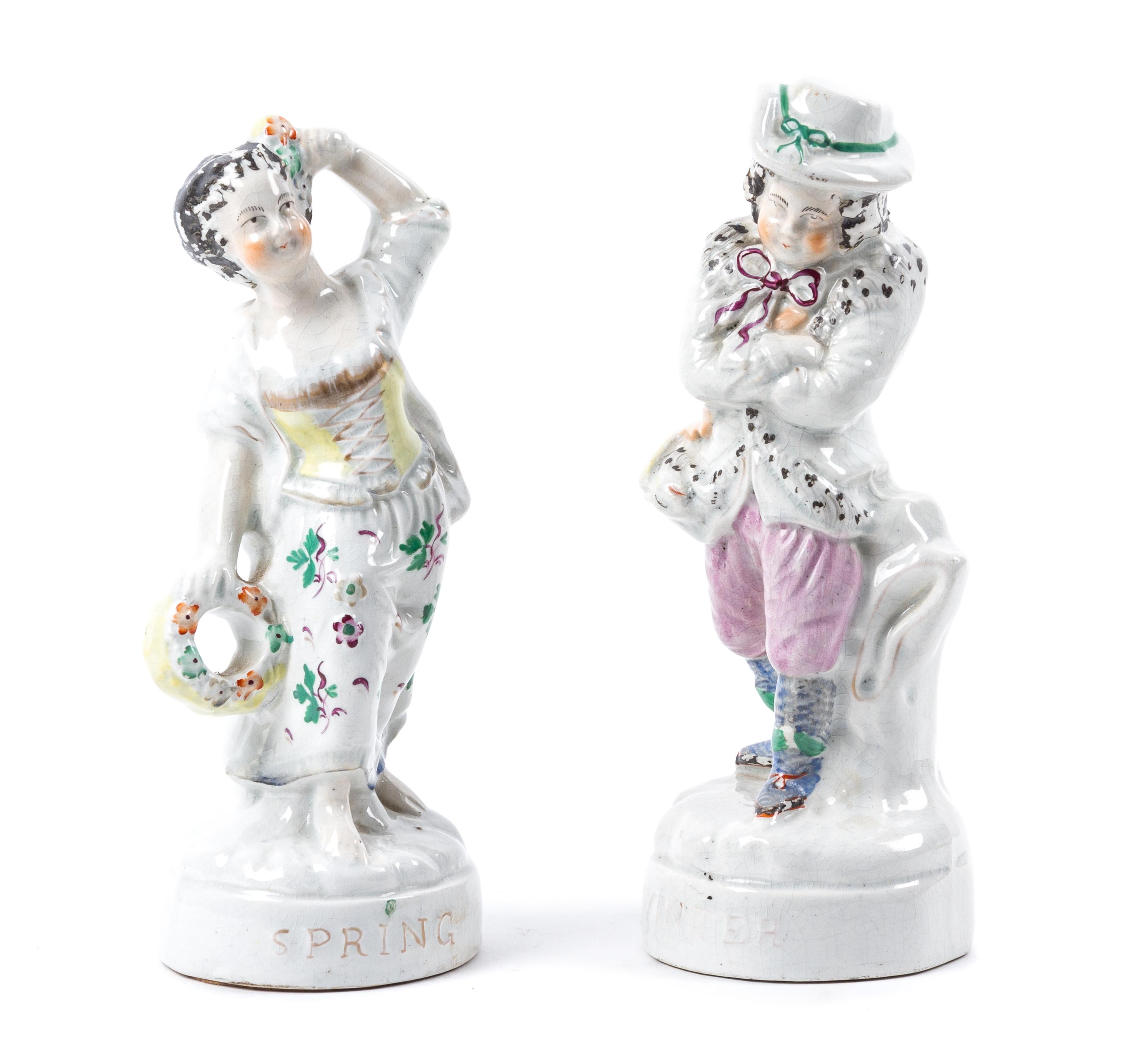 A Pair of Staffordshire Figures Height 8 3/4 inches.