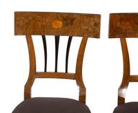 A Set of Four Biedermeier Fruitwood Inlaid Walnut Dining Chairs