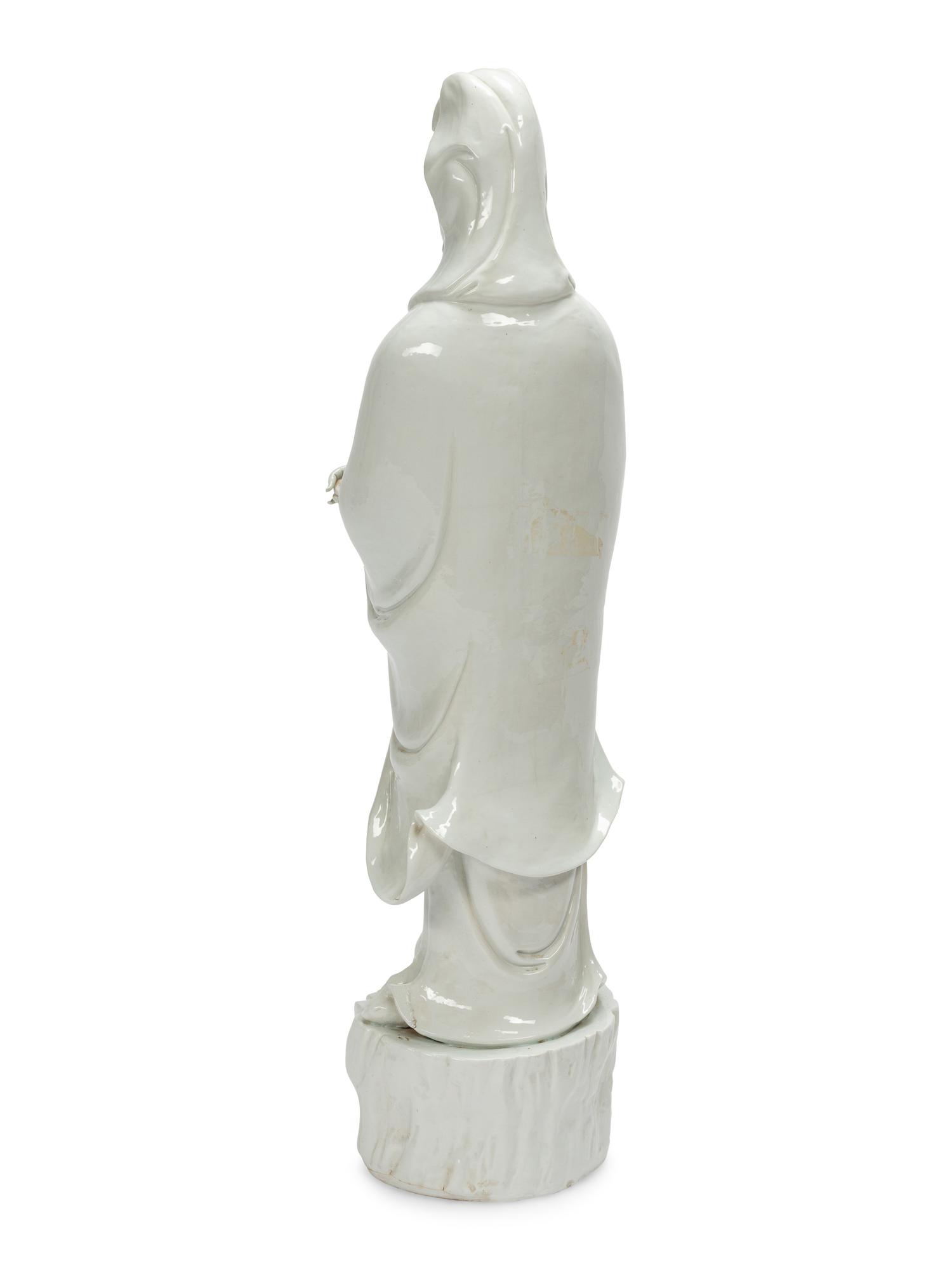 A Large Chinese Export White Glazed Porcelain Figure of Guanyin