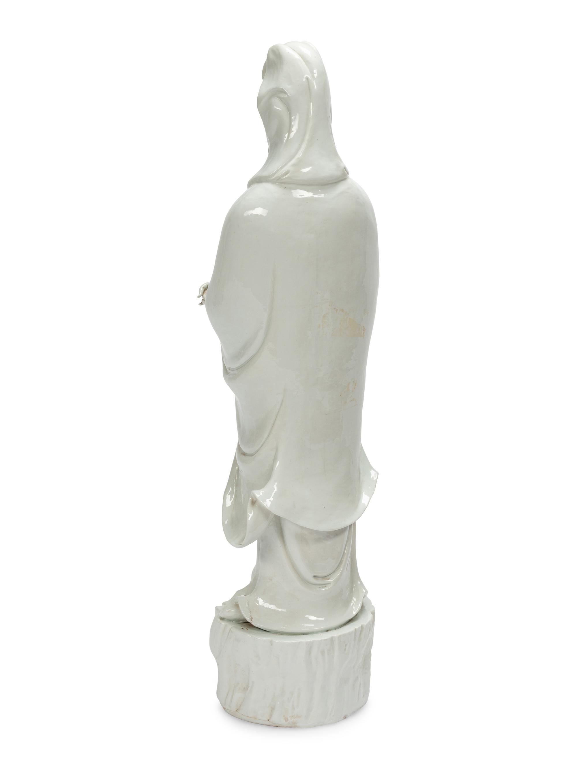 A Large Chinese Export White Glazed Porcelain Figure of Guanyin