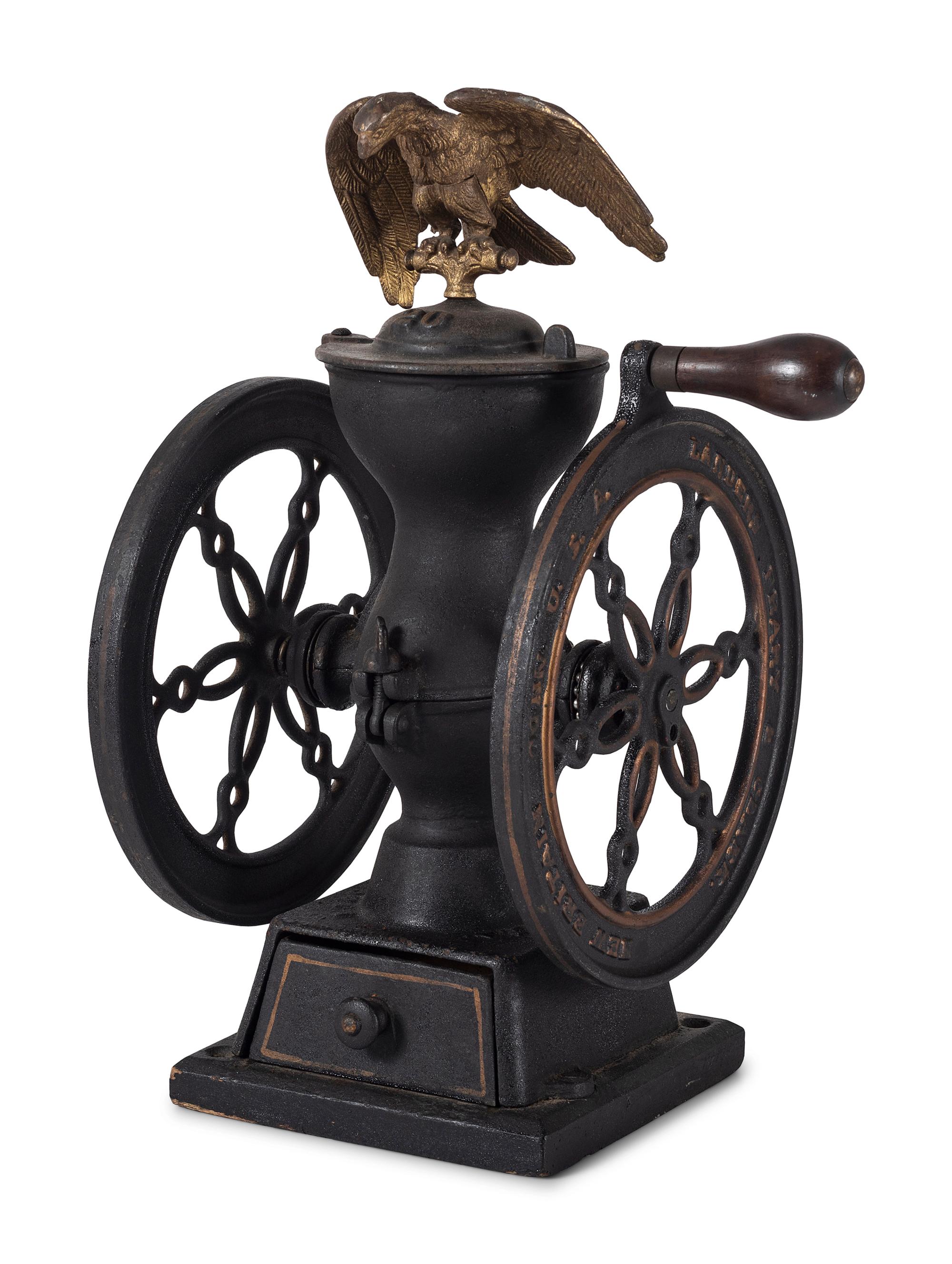 A Landers, Frary & Clark Cast Iron Coffee Mill with an Eagle Finial