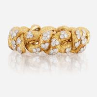 A gold, diamond, and platinum bracelet