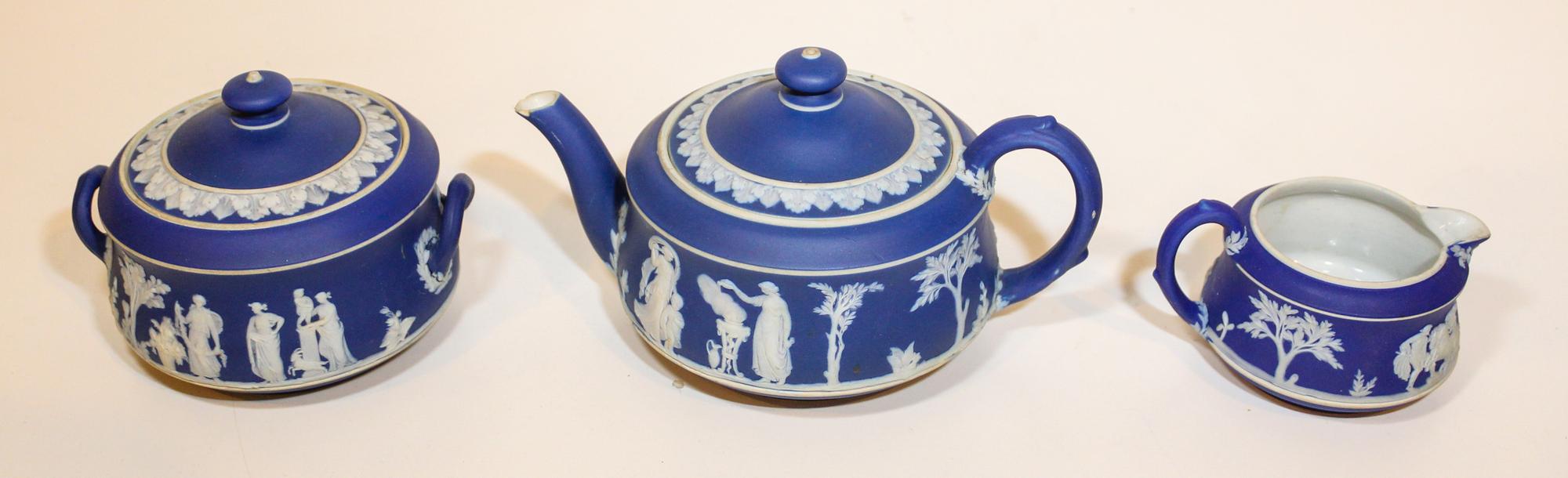 A Wedgwood Tea Service Width of teapot over handle 7 1/2 inches.