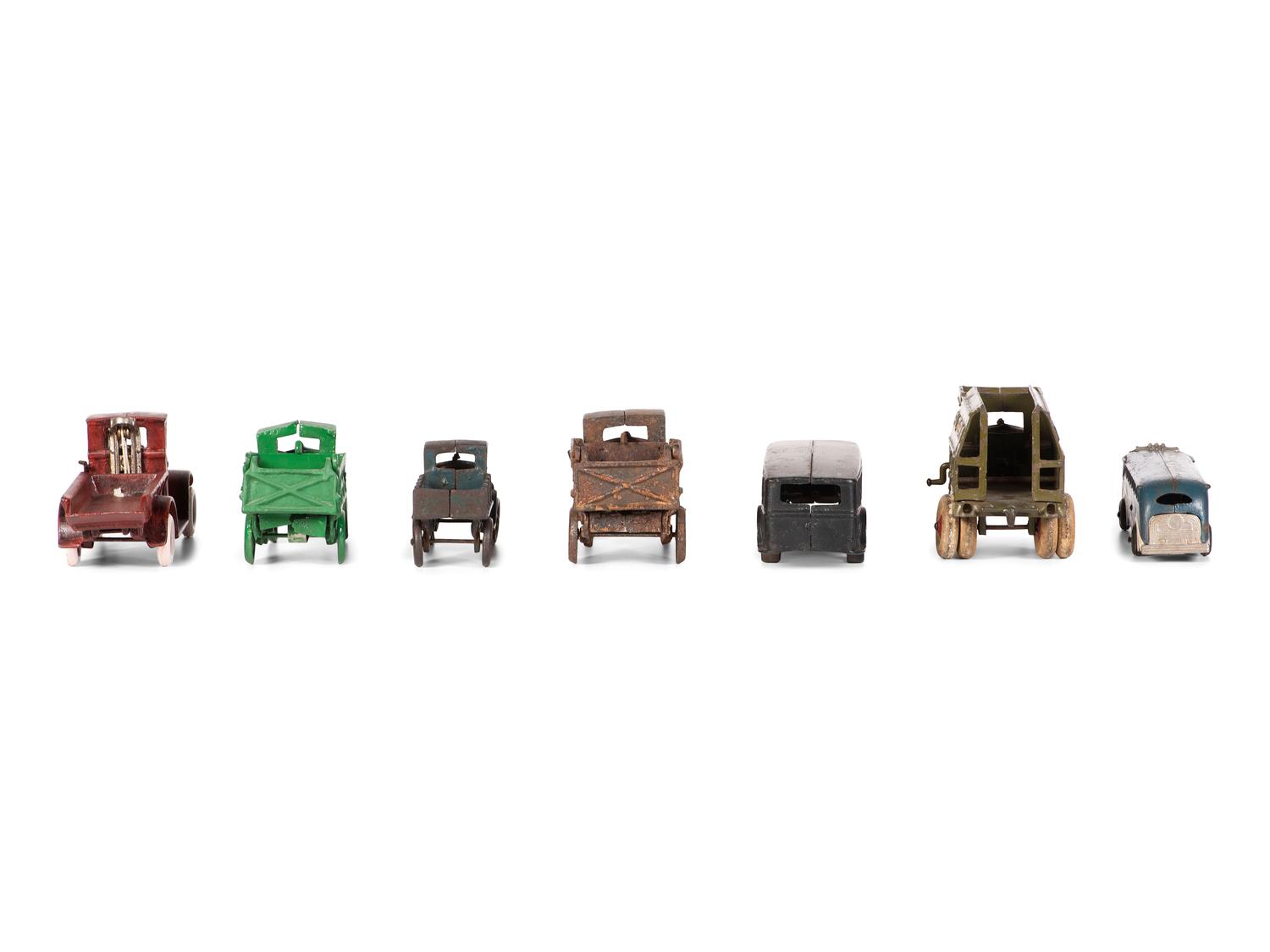 Seven Painted Cast Iron Toy Vehicles