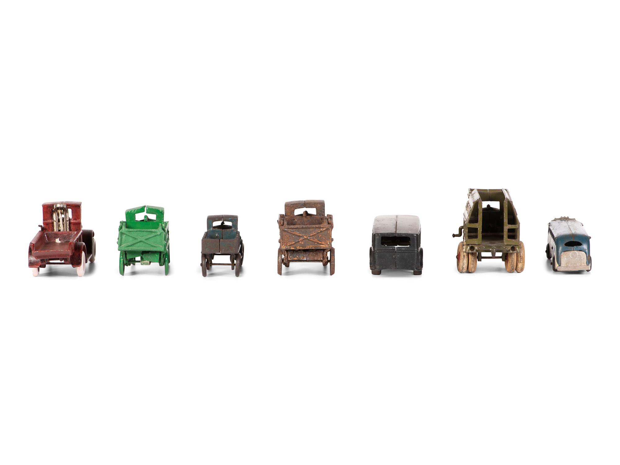 Seven Painted Cast Iron Toy Vehicles