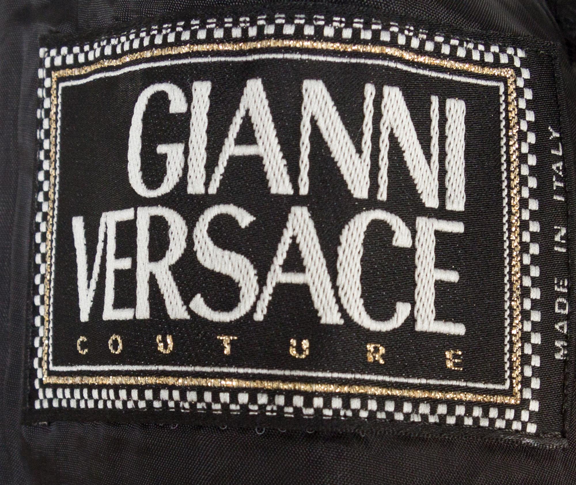 A Gianni Versace Black Bondage Jacket, Size 42.