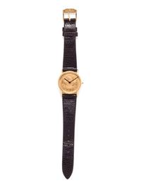 BUECHE GIROD, 18K YELLOW GOLD US $10 COIN WRISTWATCH