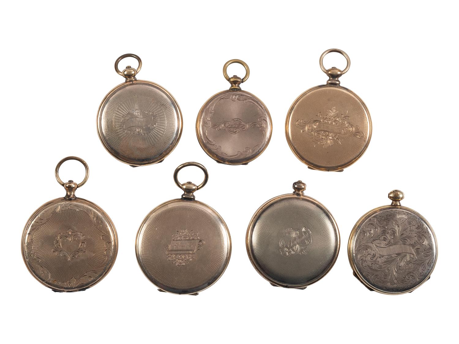[EARLY PHOTOGRAPHY]. A group of 7 lockets containing 14 daguerreotypes including couples.