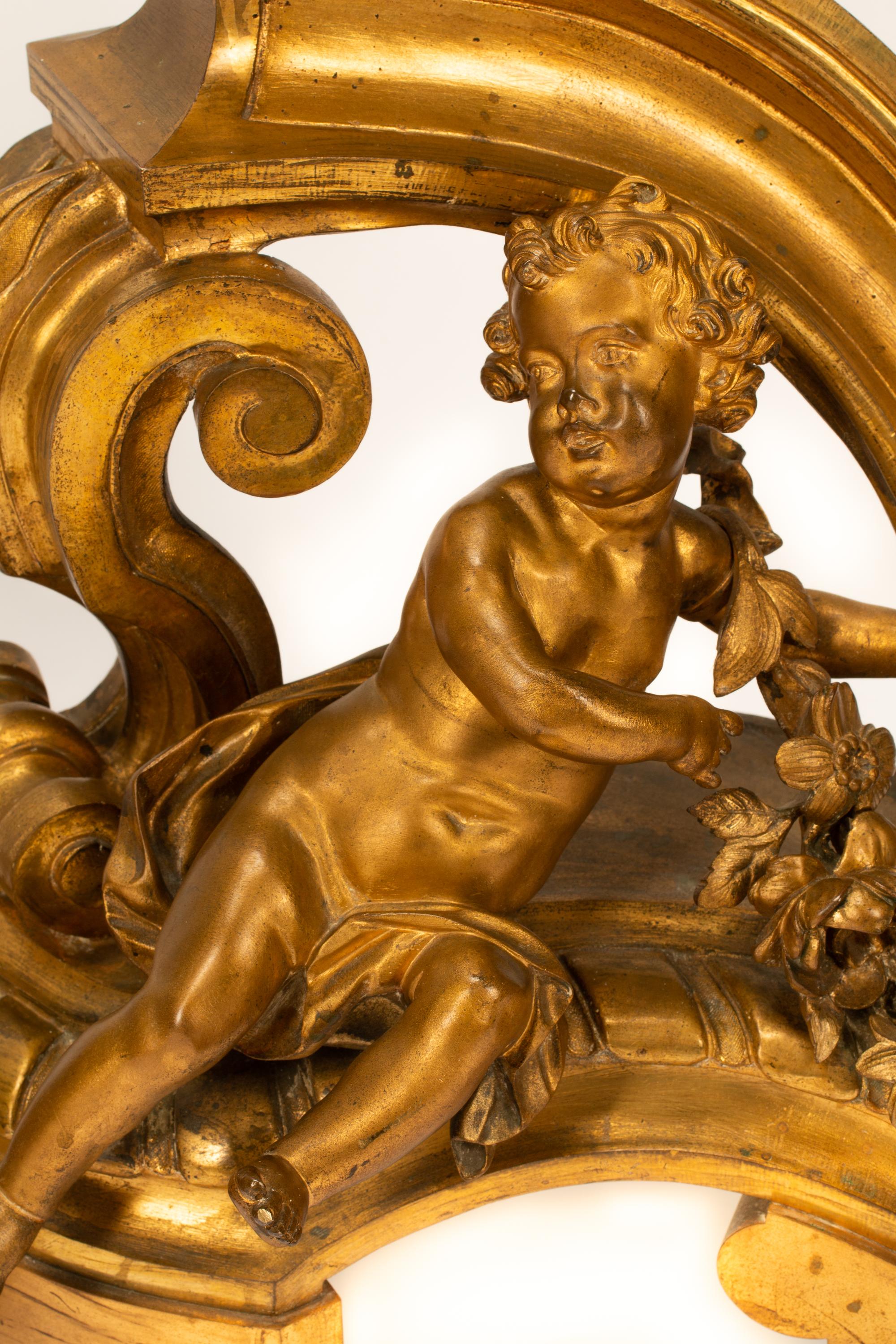 A Pair of Large Louis XV Style Gilt Bronze Figural Chenets