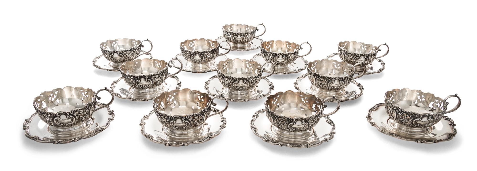 A Set of Twelve American Silver Teacups and Saucers, Gorham Mfg. Co., Providence, RI, 20th Century, each with a foliate decorated borde
