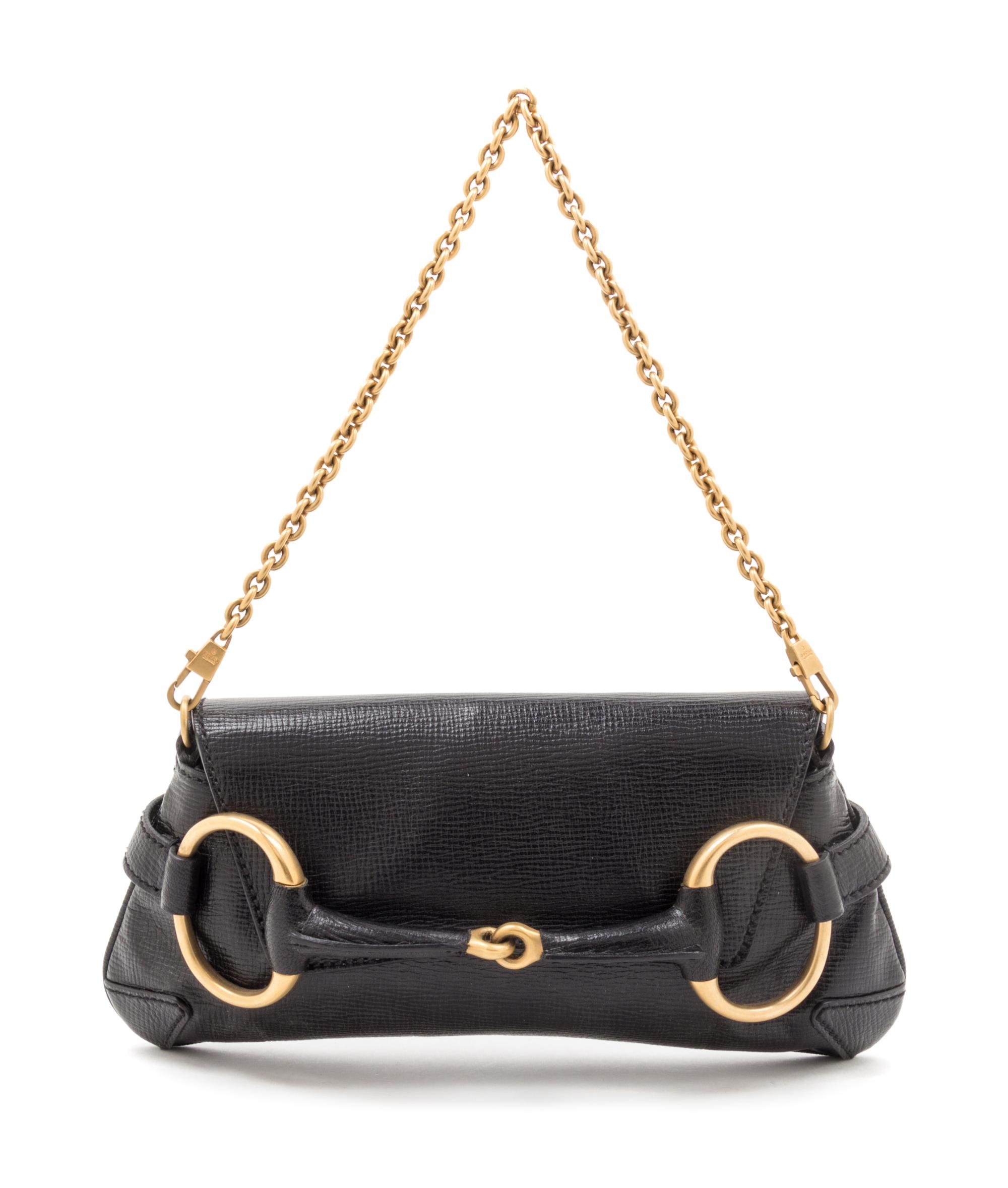 A Gucci Black Leather Handbag, 8.5" x 6.5" x 2.5".