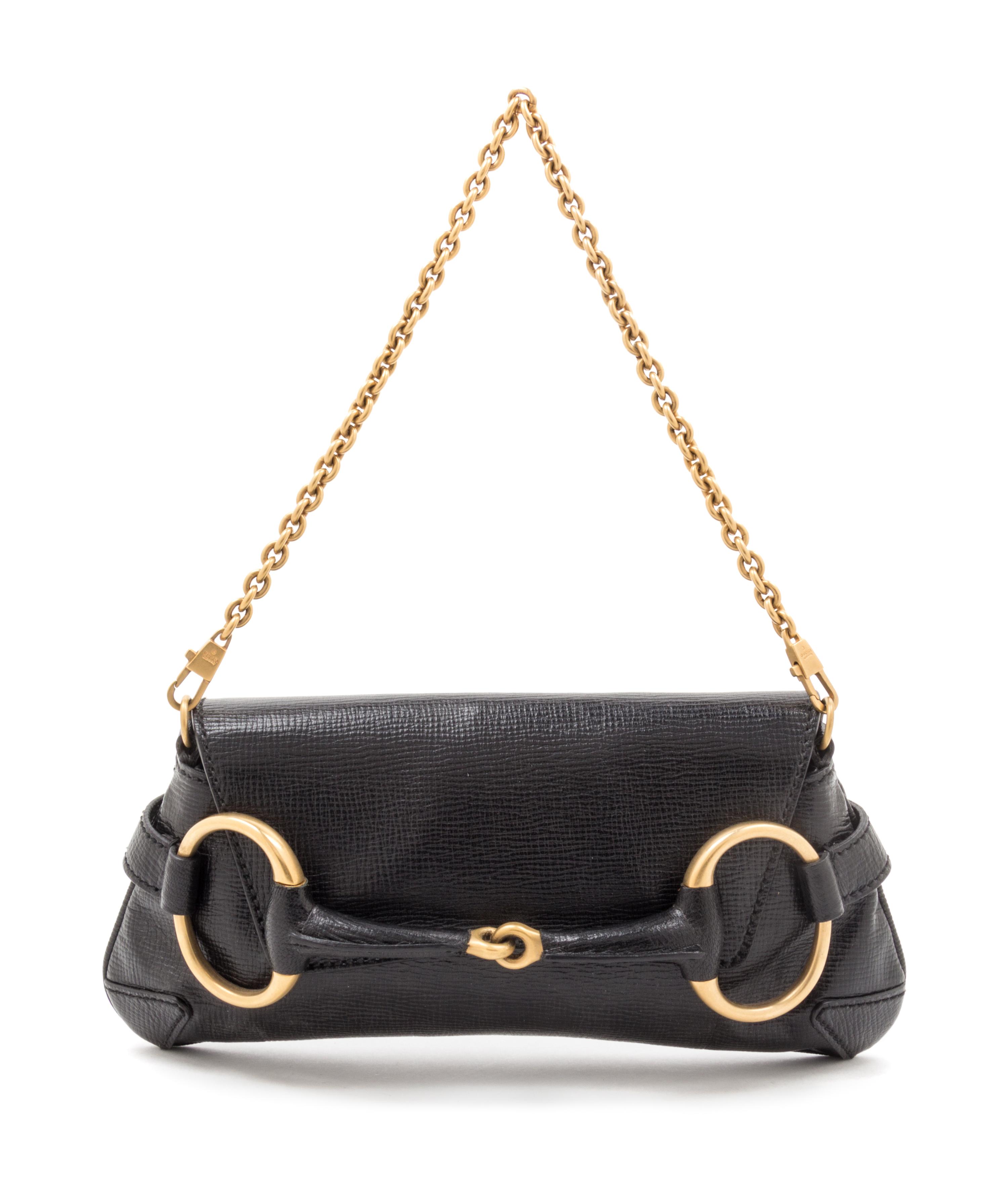 A Gucci Black Leather Handbag, 8.5" x 6.5" x 2.5".