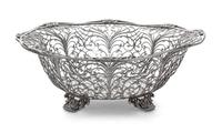 An American Silver Basket, Howard & Co., New York, NY, having a scrolling foliate open bowl with an octagonal bottom, raised on four sh