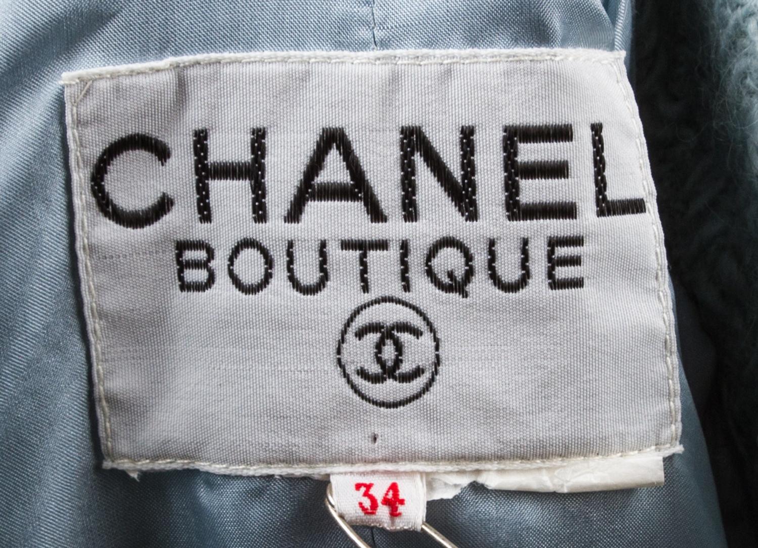 A Chanel Dusty Blue Wool Boucle Skirt Suit Ensemble, Jacket and skirt size 34.
