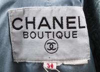 A Chanel Dusty Blue Wool Boucle Skirt Suit Ensemble, Jacket and skirt size 34.