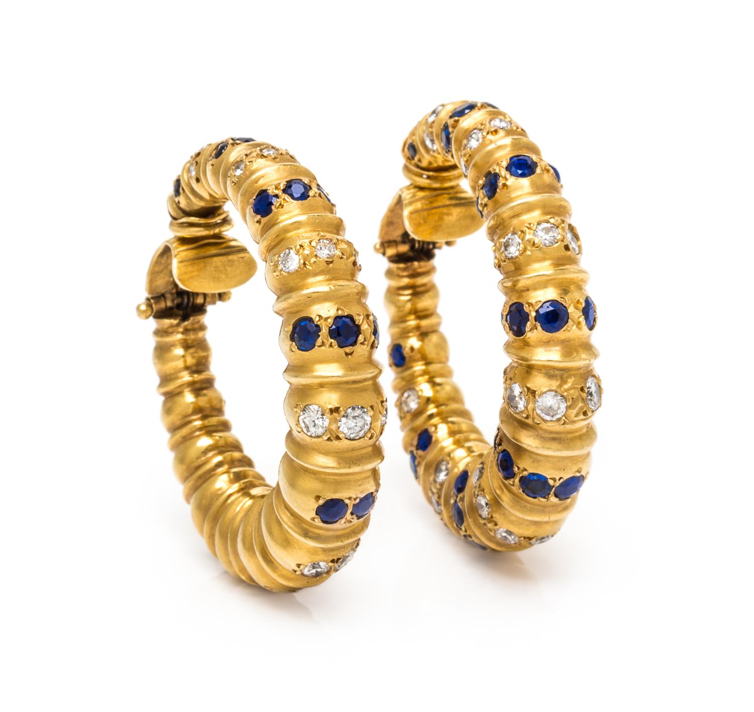 A Pair of 18 Karat Yellow Gold, Sapphire and Diamond Hoop Earclips, 26.10 dwts.
