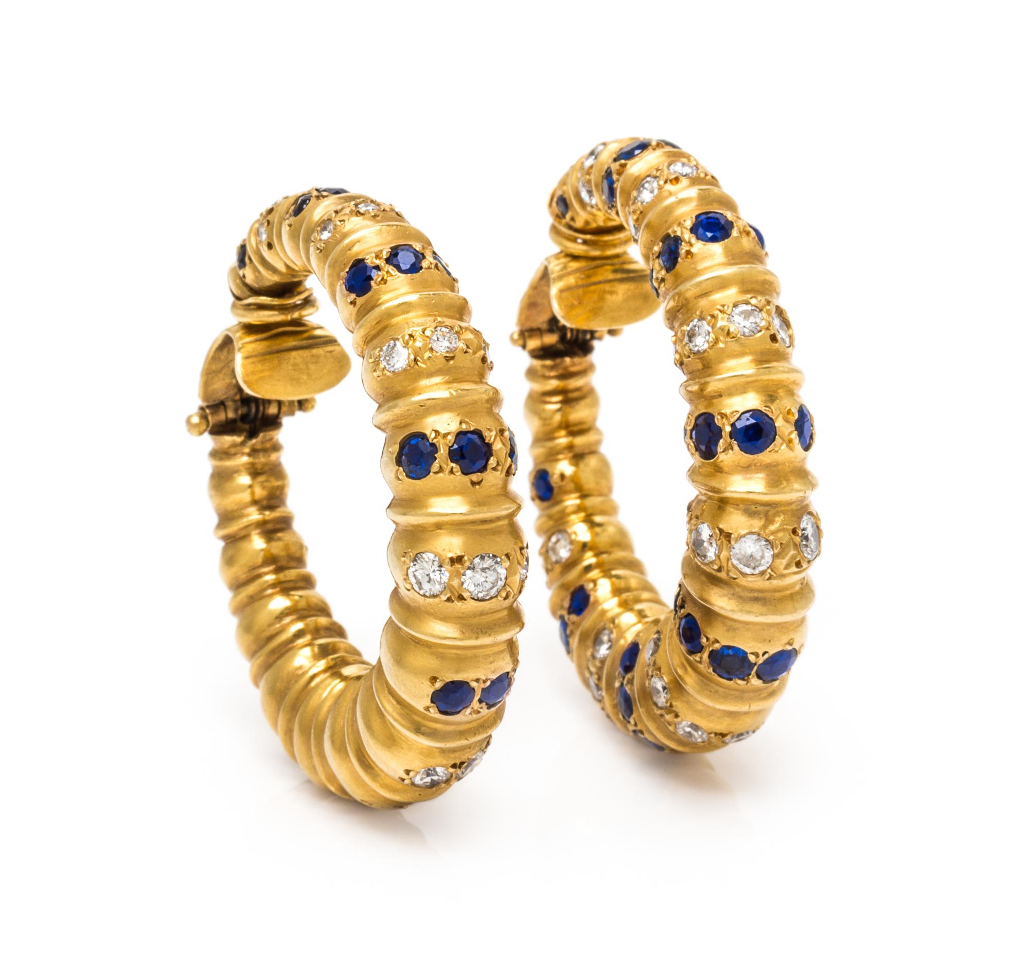 A Pair of 18 Karat Yellow Gold, Sapphire and Diamond Hoop Earclips, 26.10 dwts.