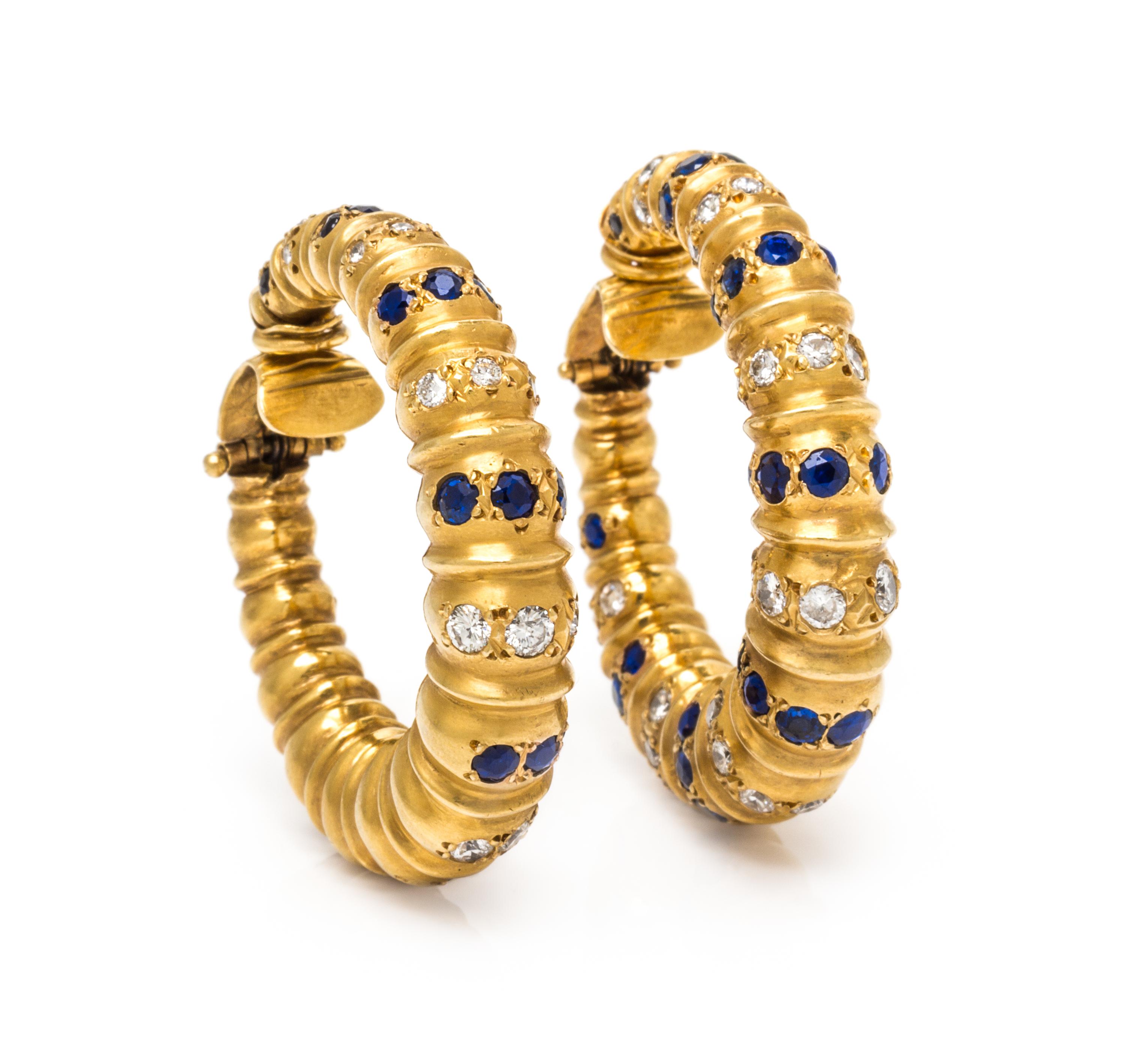 A Pair of 18 Karat Yellow Gold, Sapphire and Diamond Hoop Earclips, 26.10 dwts.