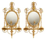 A Pair of Continental Giltwood Girandole Mirrors Height 59 x width 30 inches. — 19TH CENTURY