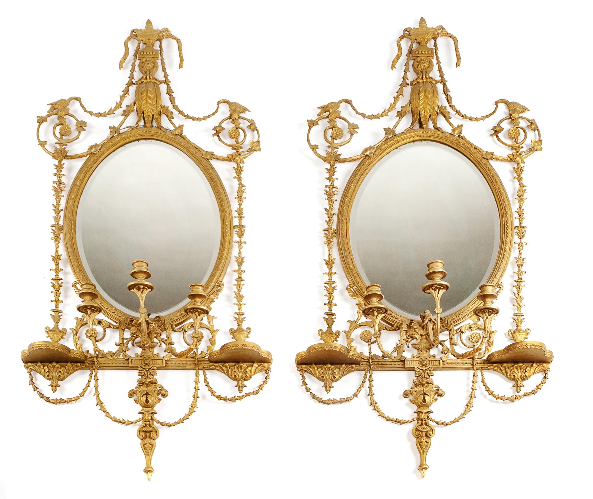 A Pair of Continental Giltwood Girandole Mirrors Height 59 x width 30 inches. — 19TH CENTURY