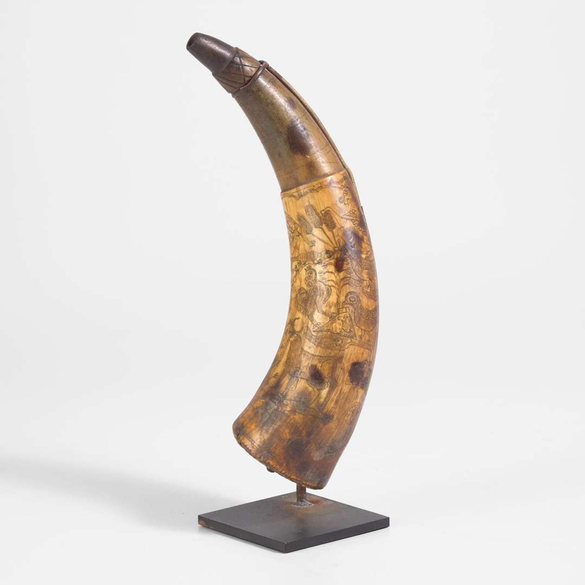 A carved and incised powder horn Pennsylvania, dated "1787"