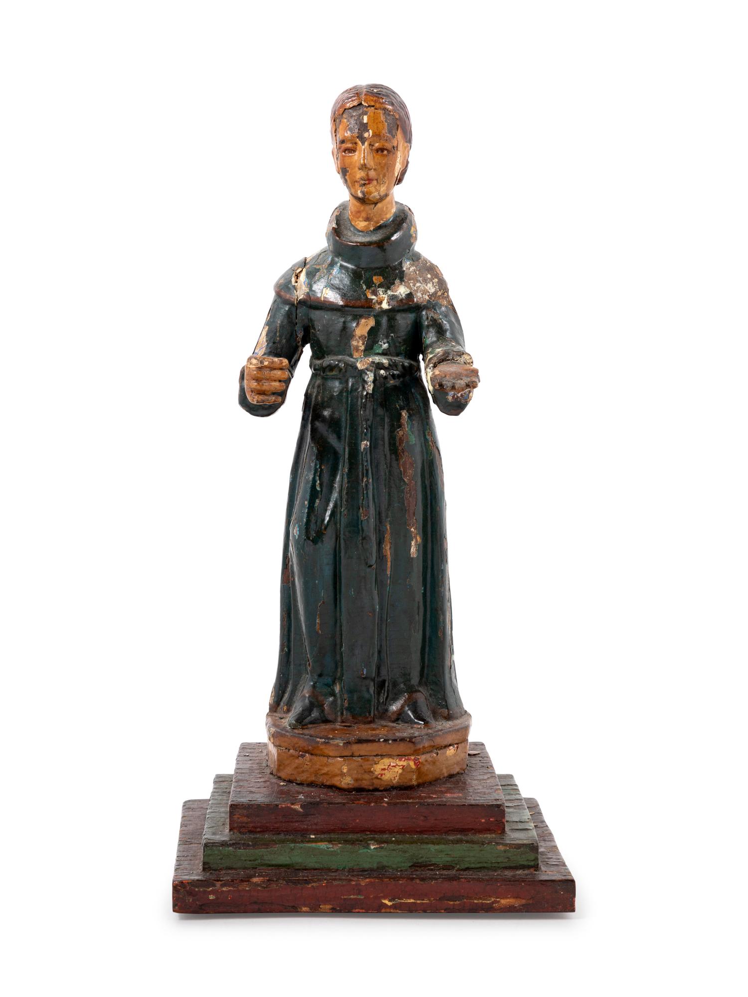 A Continental Painted Figure of a Saint