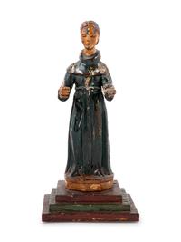 A Continental Painted Figure of a Saint