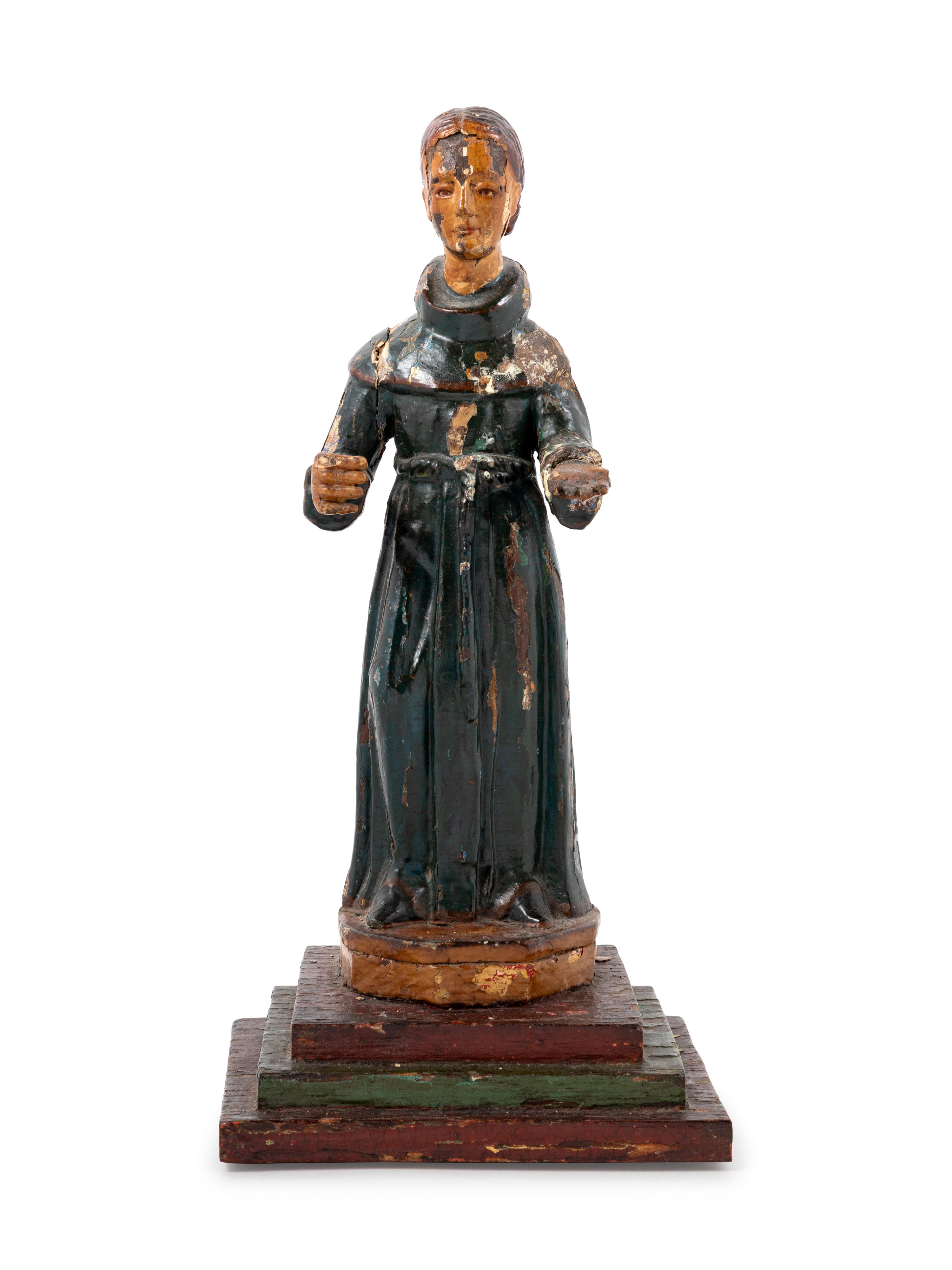 A Continental Painted Figure of a Saint