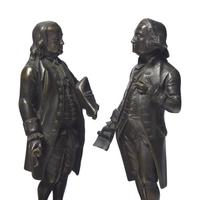 A Group of Four Patinated Bronze Figures or Bookends