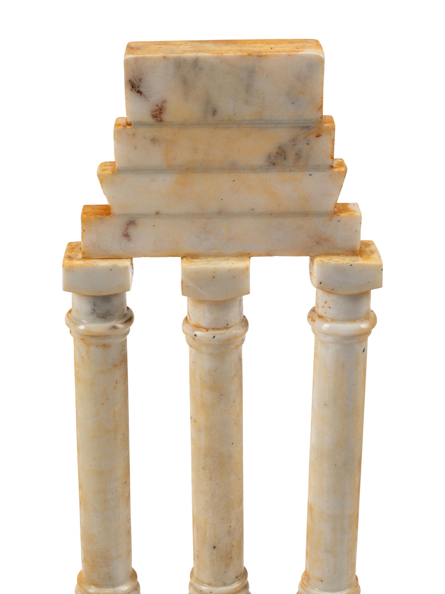 A Set of Four Italian Grand Tour Style Marble Table Ornaments