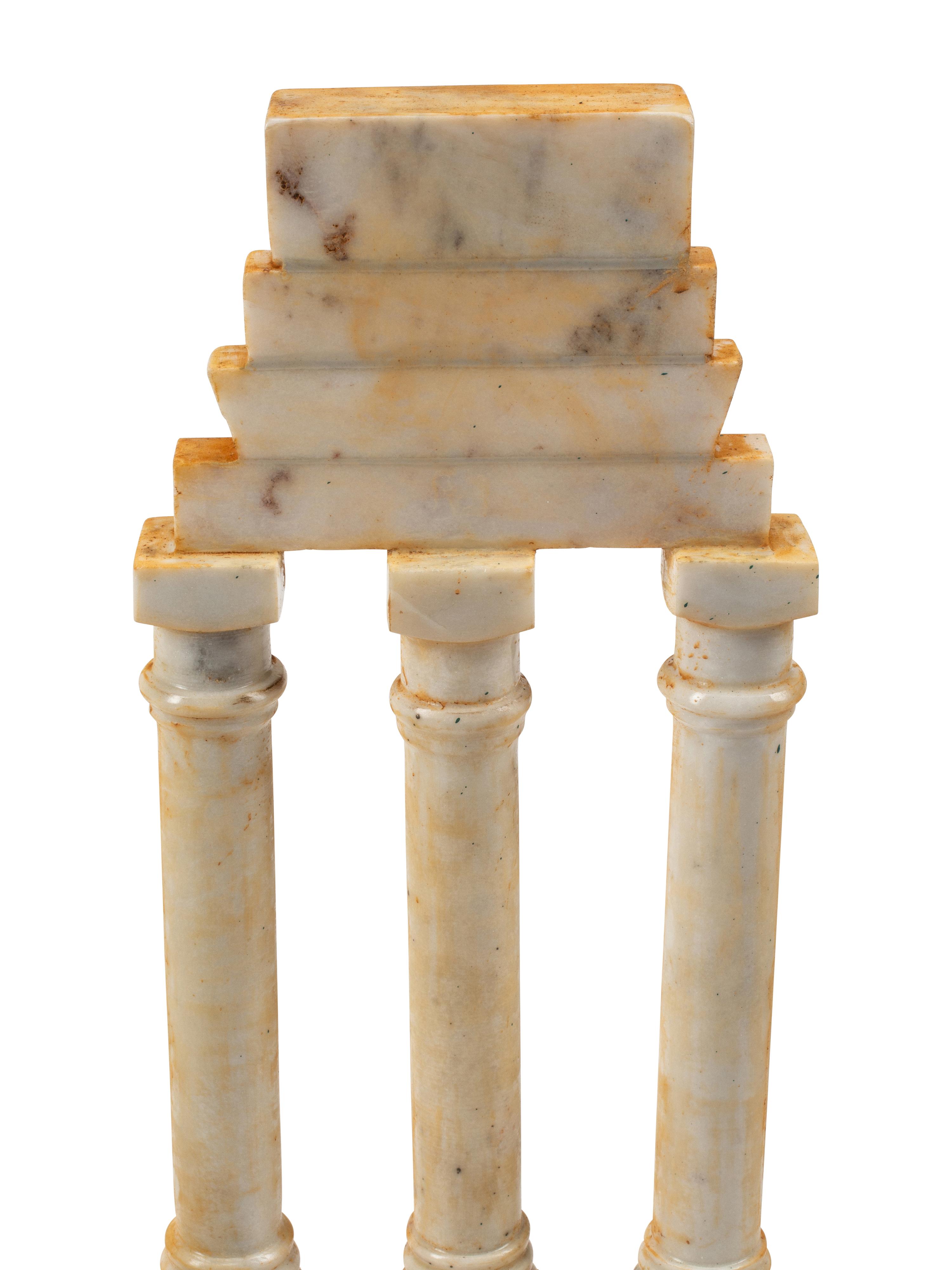 A Set of Four Italian Grand Tour Style Marble Table Ornaments