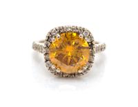 A White Gold, Colored Diamond and Diamond Ring, 3.20 dwts.