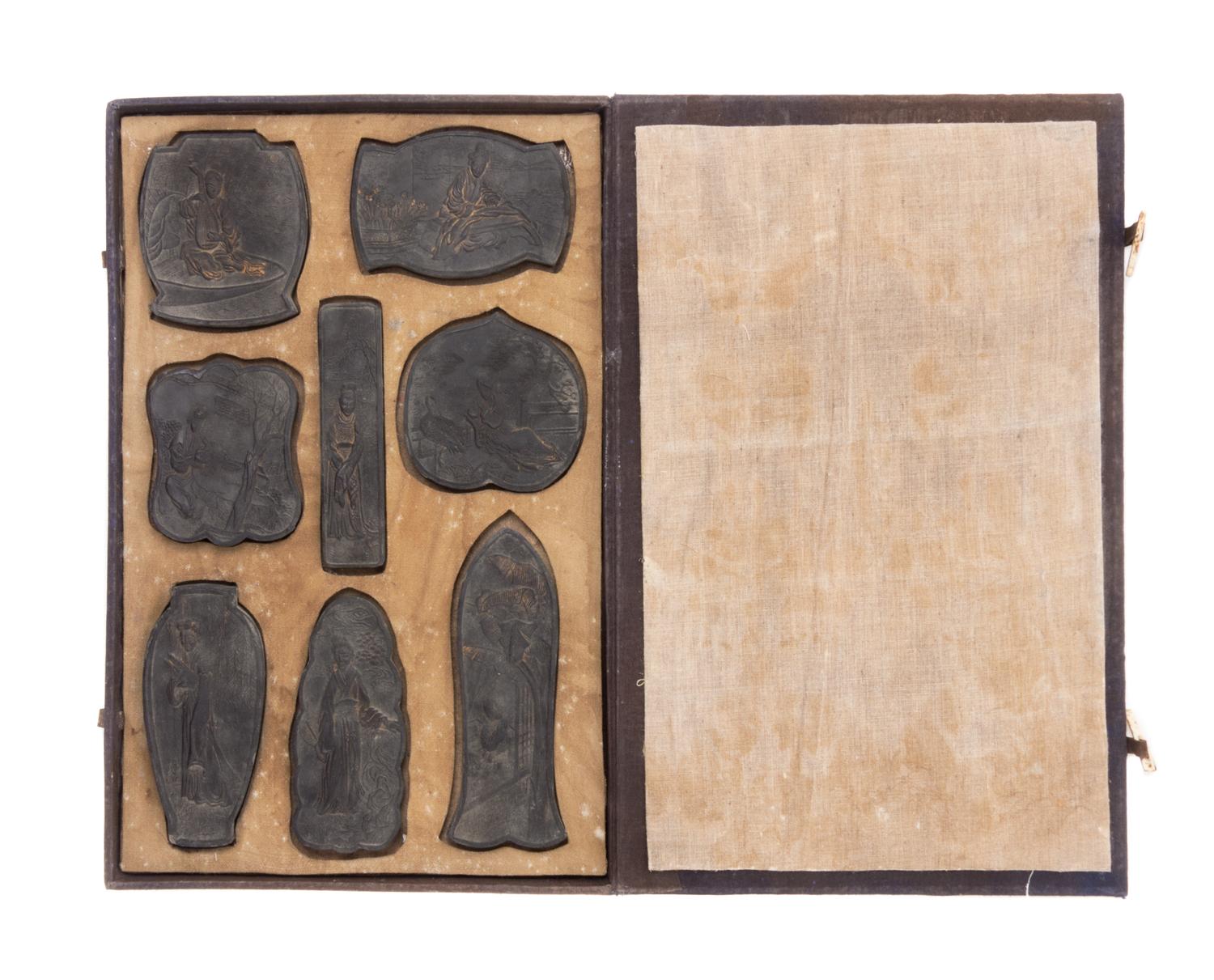 A Set of Eight Ink Cakes Length of longest 4 5/8 inches.