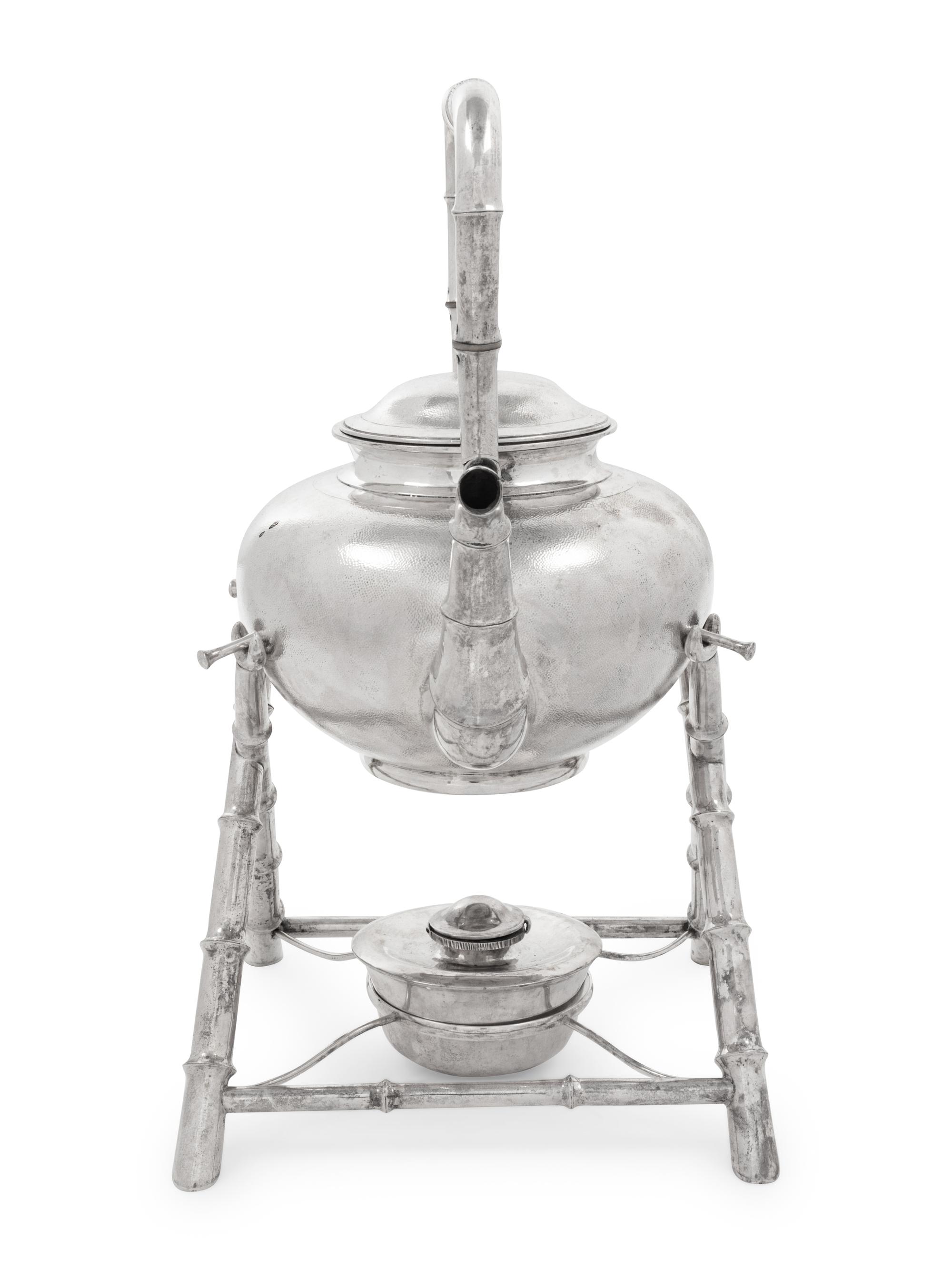 A Chinese Export Silver Teapot and Stand