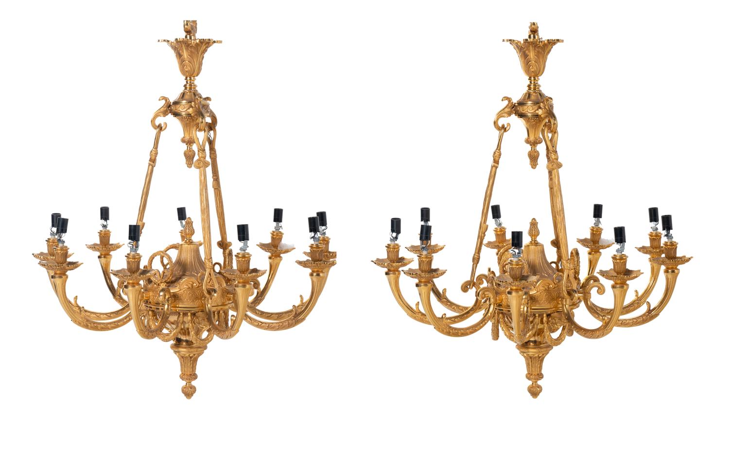 A Pair of Empire Style Gilt Bronze Nine-Light Chandeliers