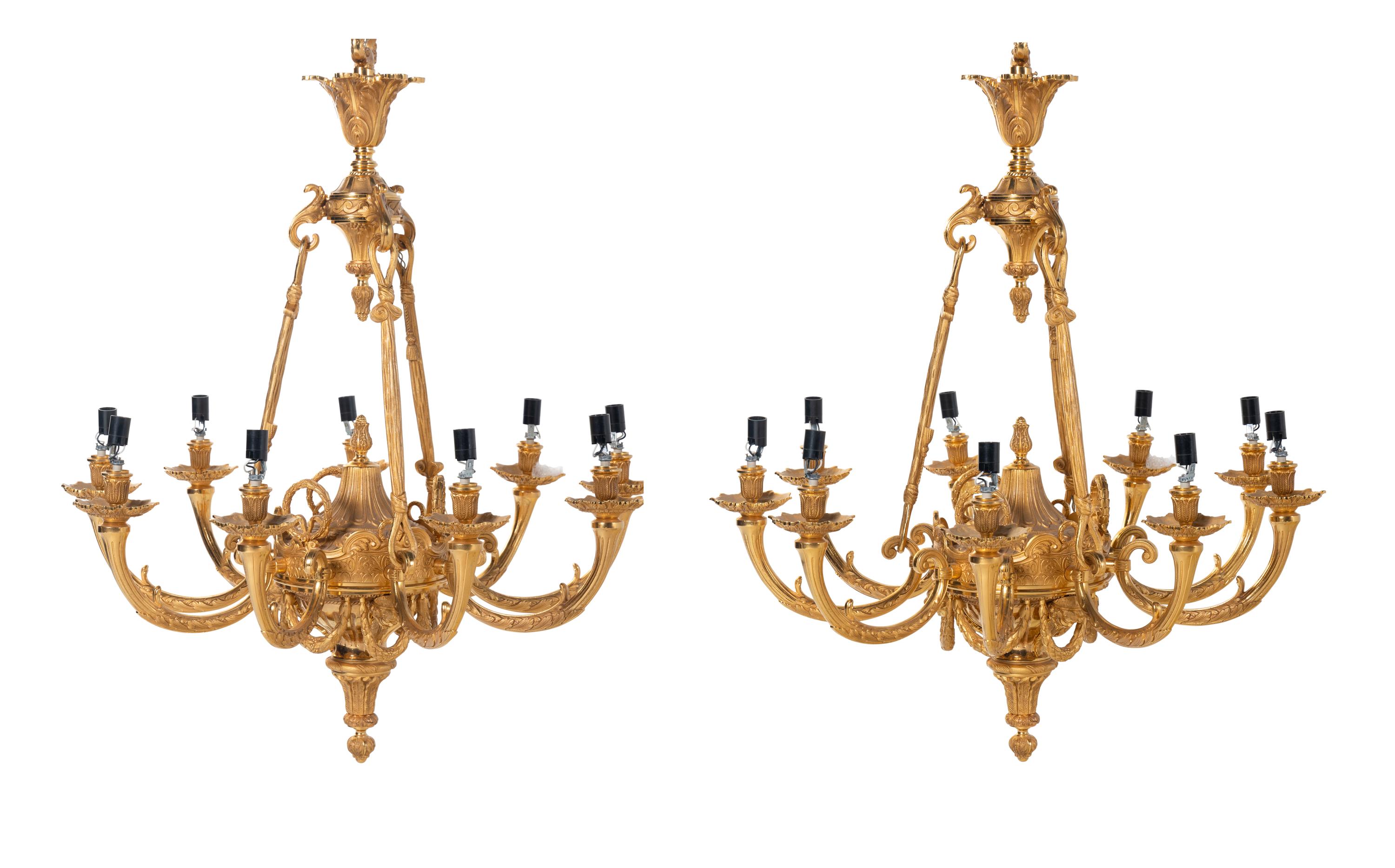 A Pair of Empire Style Gilt Bronze Nine-Light Chandeliers