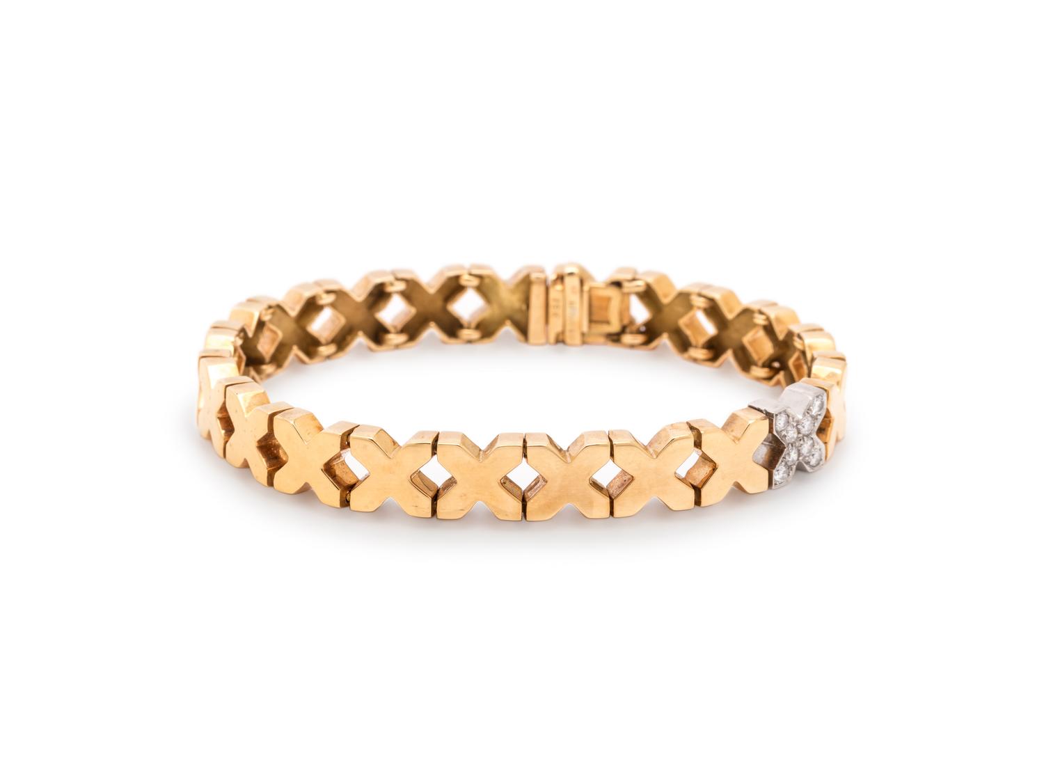 TIFFANY & CO., YELLOW GOLD AND DIAMOND 'X' BRACELET