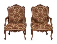 A Pair of Rococo Style Carved Walnut Armchairs