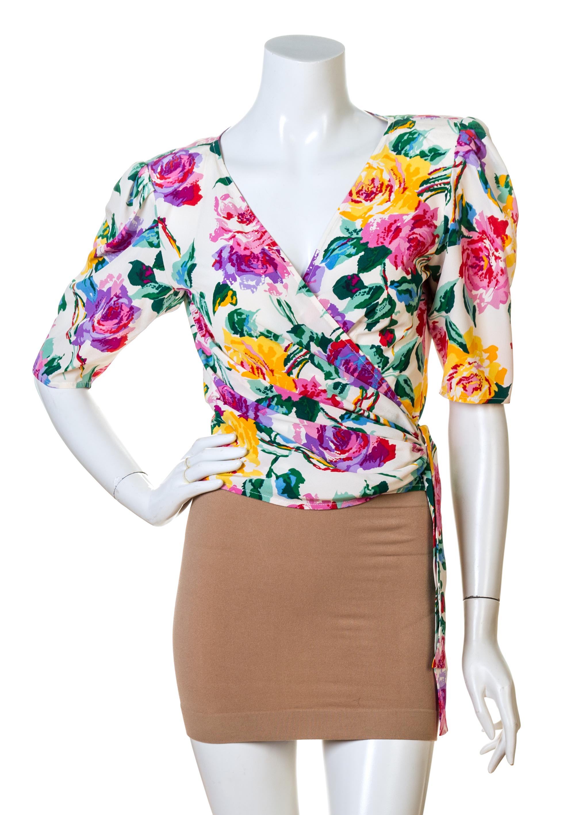 A Pair of Emanuel Ungaro Silk Floral Wrap Blouses, Black size 10, White no size.