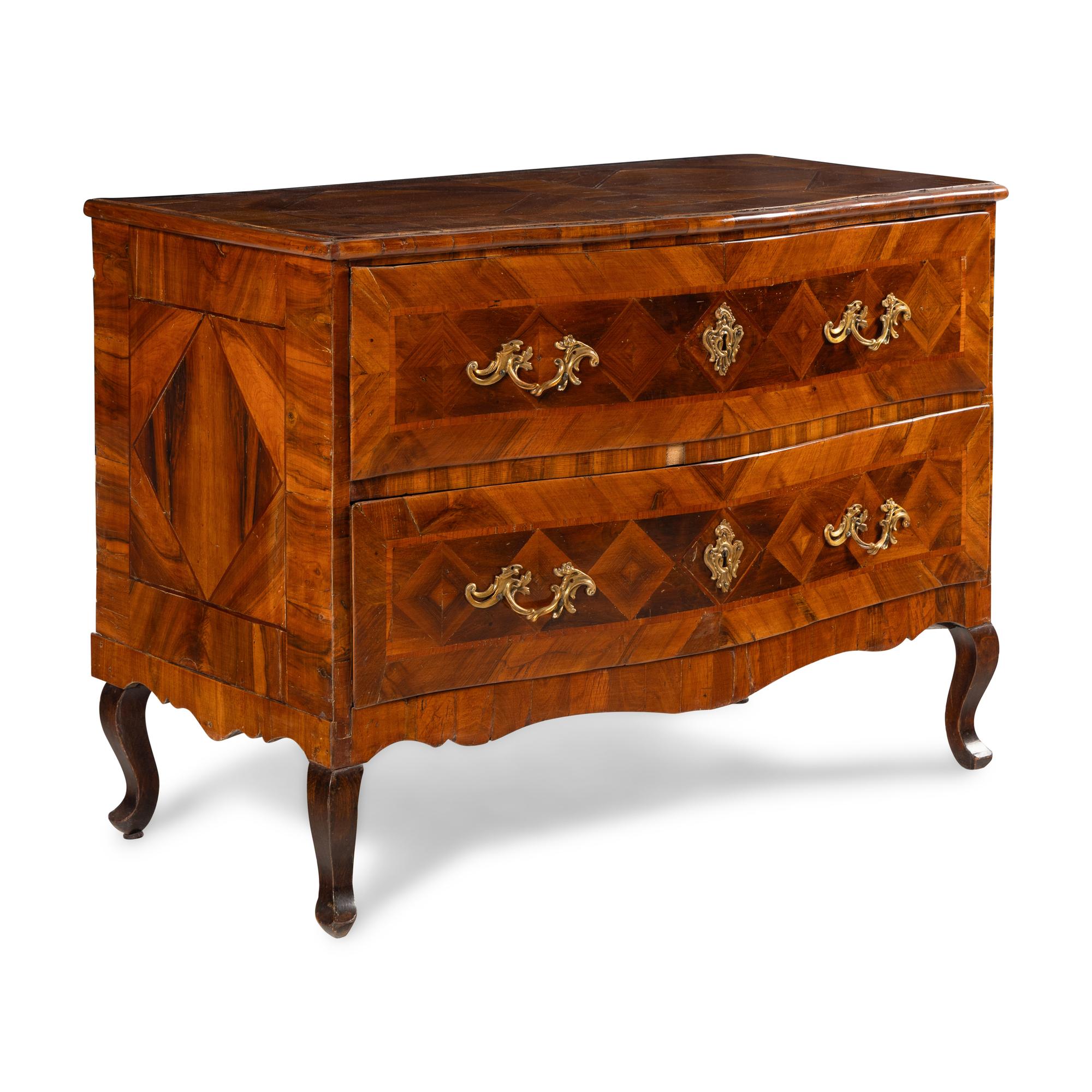 A Continental Parquetry Chest of Drawers
