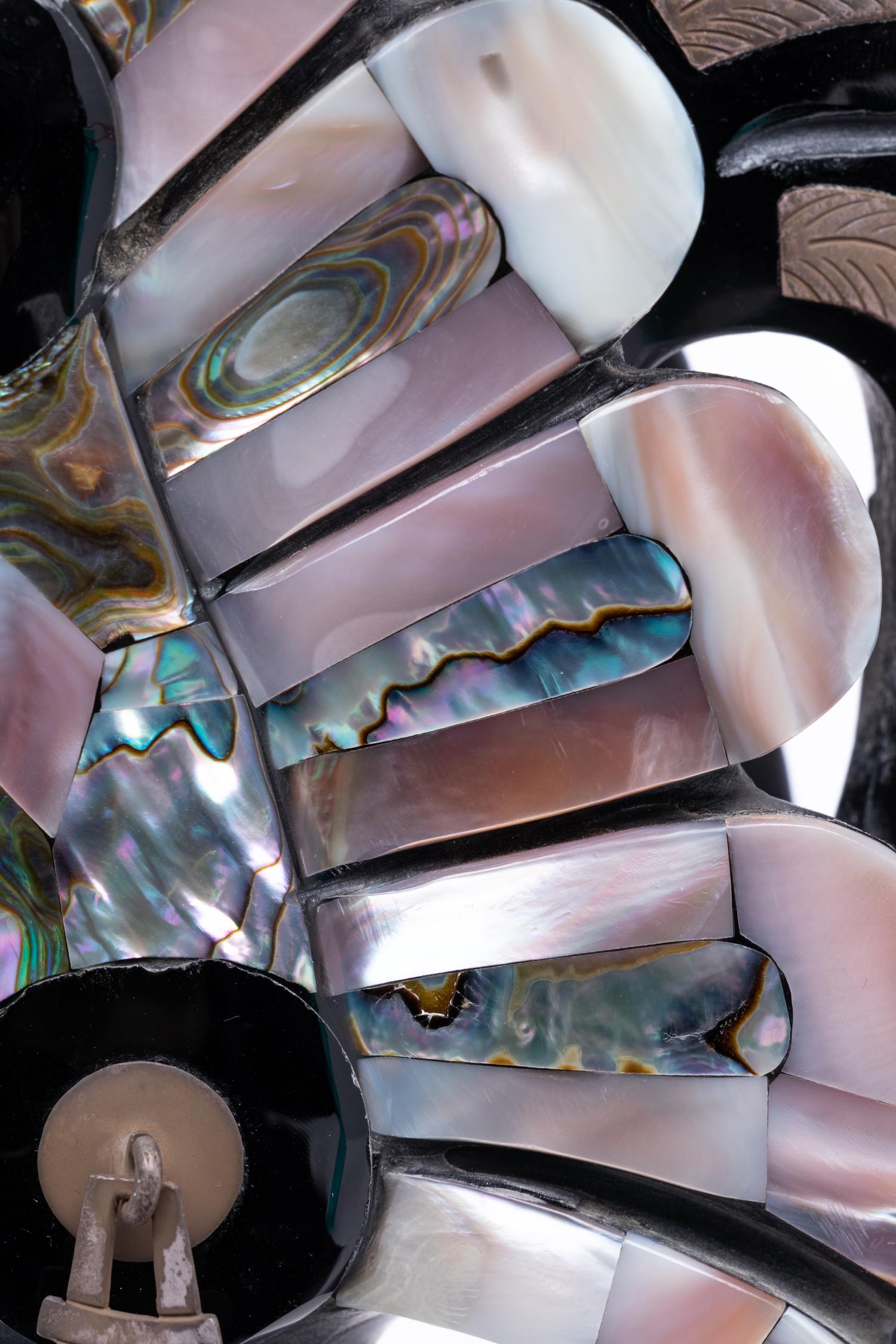 An Onyx and Mother-of-Pearl Bust of an Aztec Deity