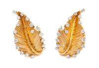 A Pair of 18 Karat Yellow Gold and Diamond Earclips, 8.60 dwts.