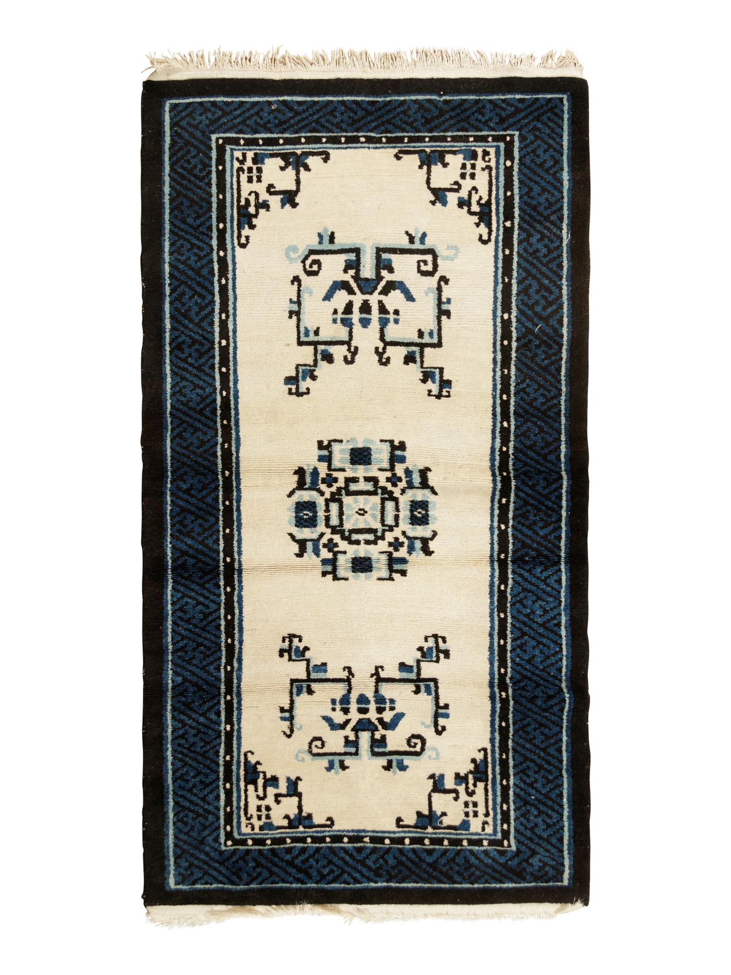 A Chinese Blue and White Wool Runner