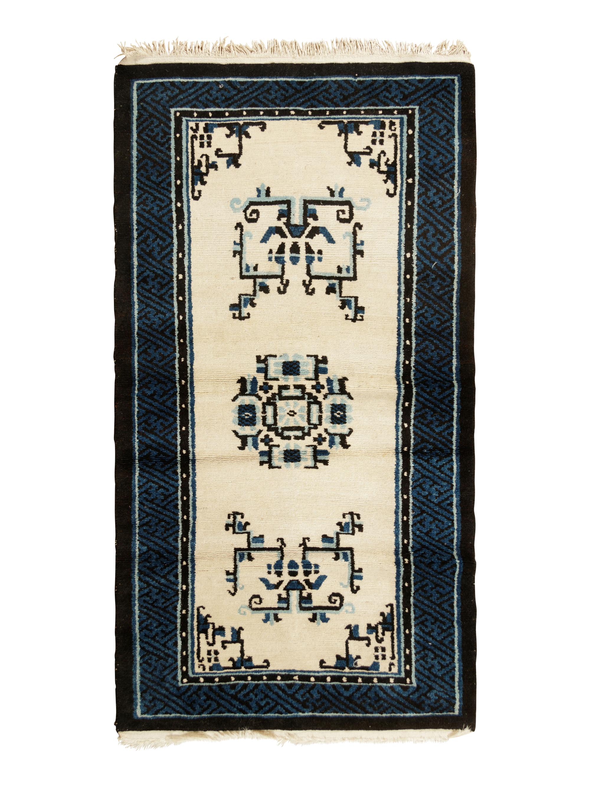 A Chinese Blue and White Wool Runner