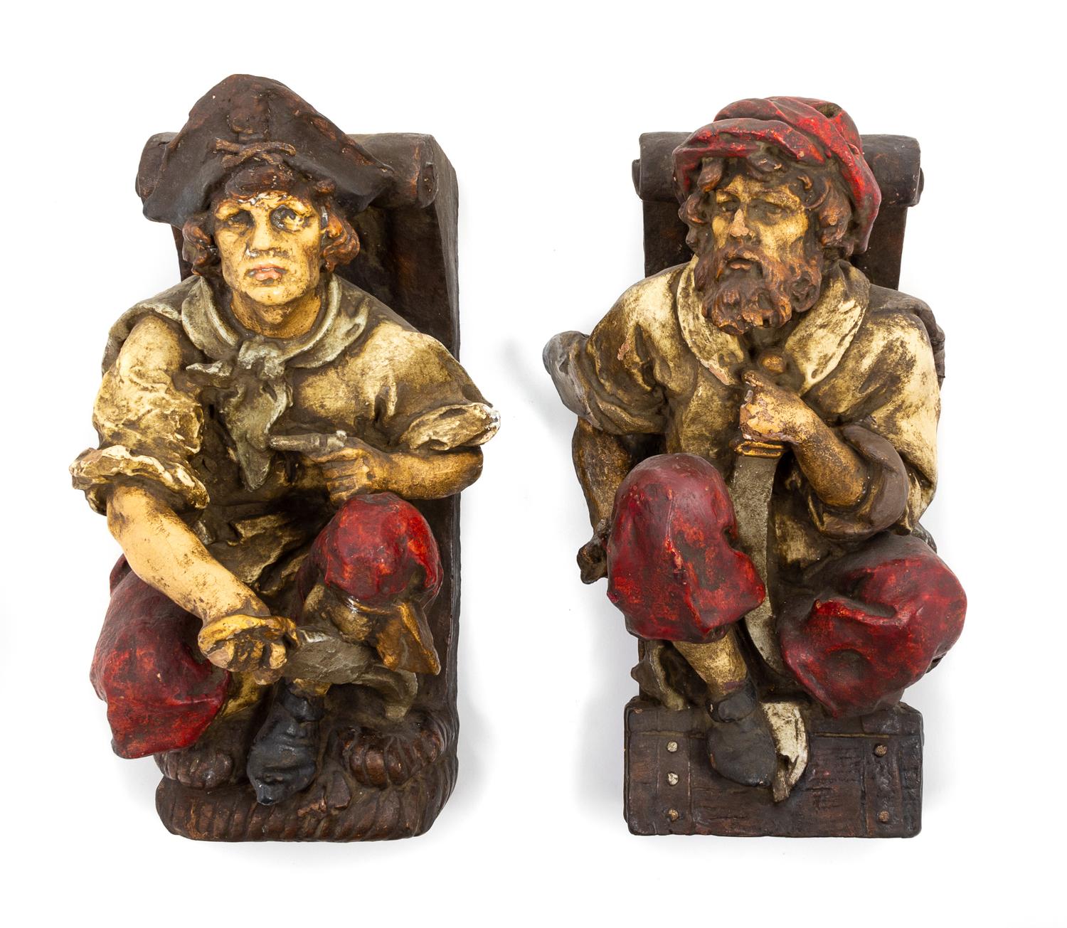 A Pair of Ceramic Figural Brackets