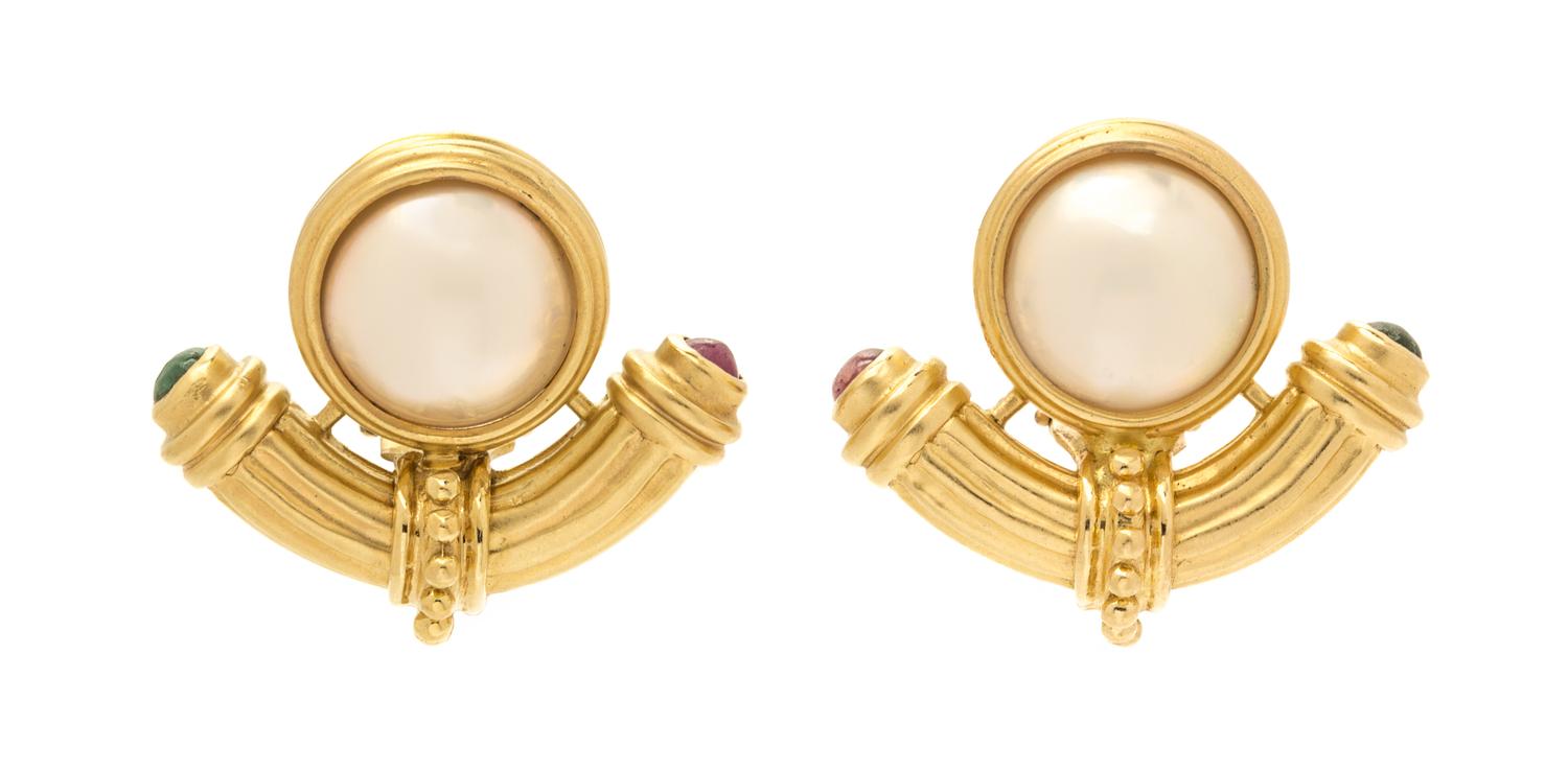 A Pair of 14 Karat Yellow Gold, Mabe Pearl, and Emerald and Ruby Earclips, 11.60 dwts.
