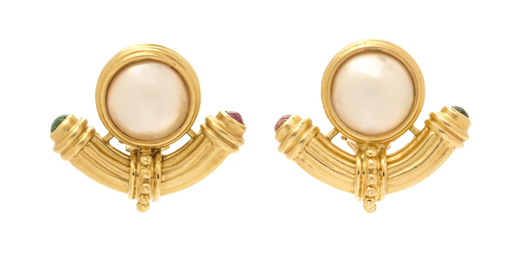A Pair of 14 Karat Yellow Gold, Mabe Pearl, and Emerald and Ruby Earclips, 11.60 dwts.